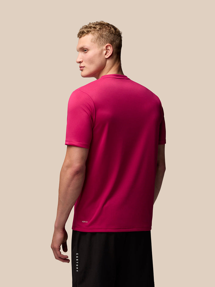 Back view of pink Adapt Training T Shirt with AerTek branding at lower back