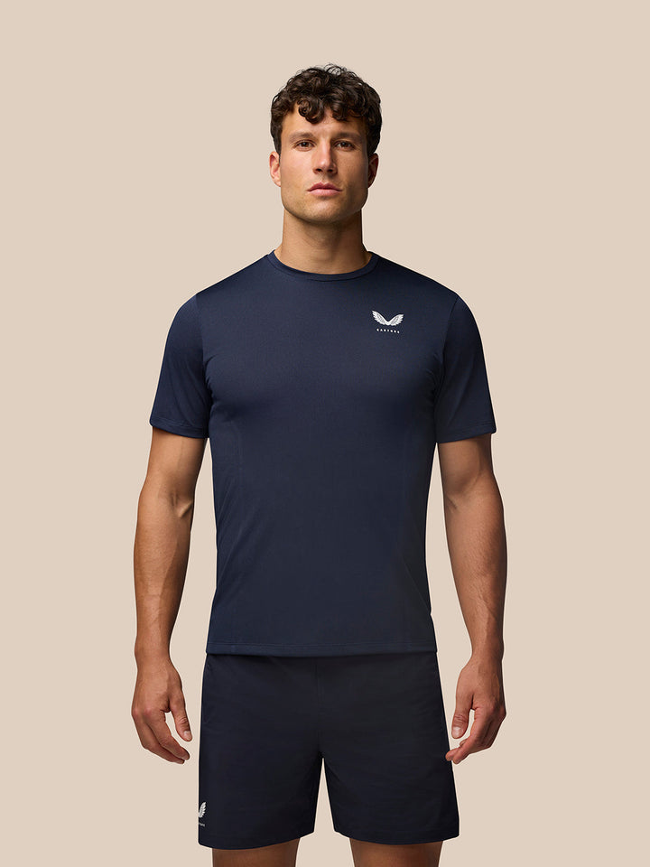Male model wearing Apex Training T-Shirt in midnight navy with textured knit and small white logo on chest.
