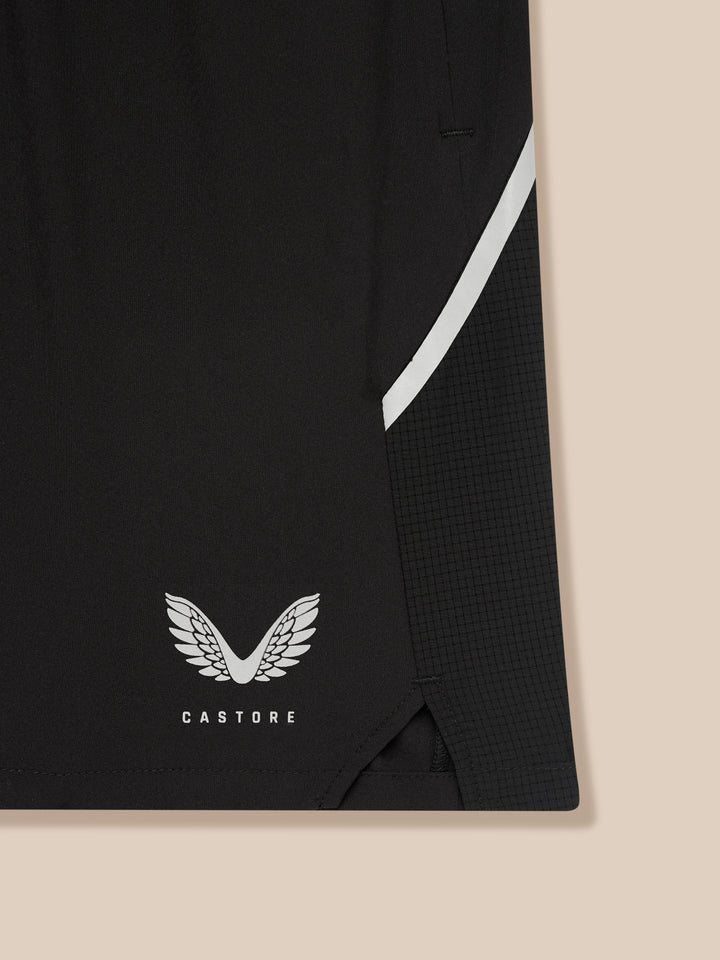 Close-up of black Apex 6 inch shorts waistband with a white diagonal side stripe along the leg.