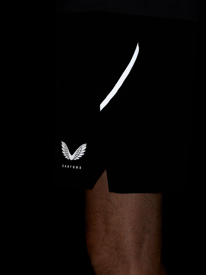 Black Apex 6 inch shorts with a white curved side stripe and Castore wings logo at the hem.