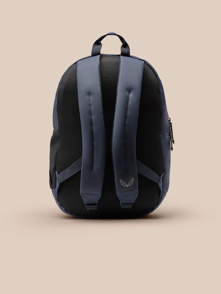 Back view of navy Active Small Backpack showing padded shoulder straps and breathable mesh back panel