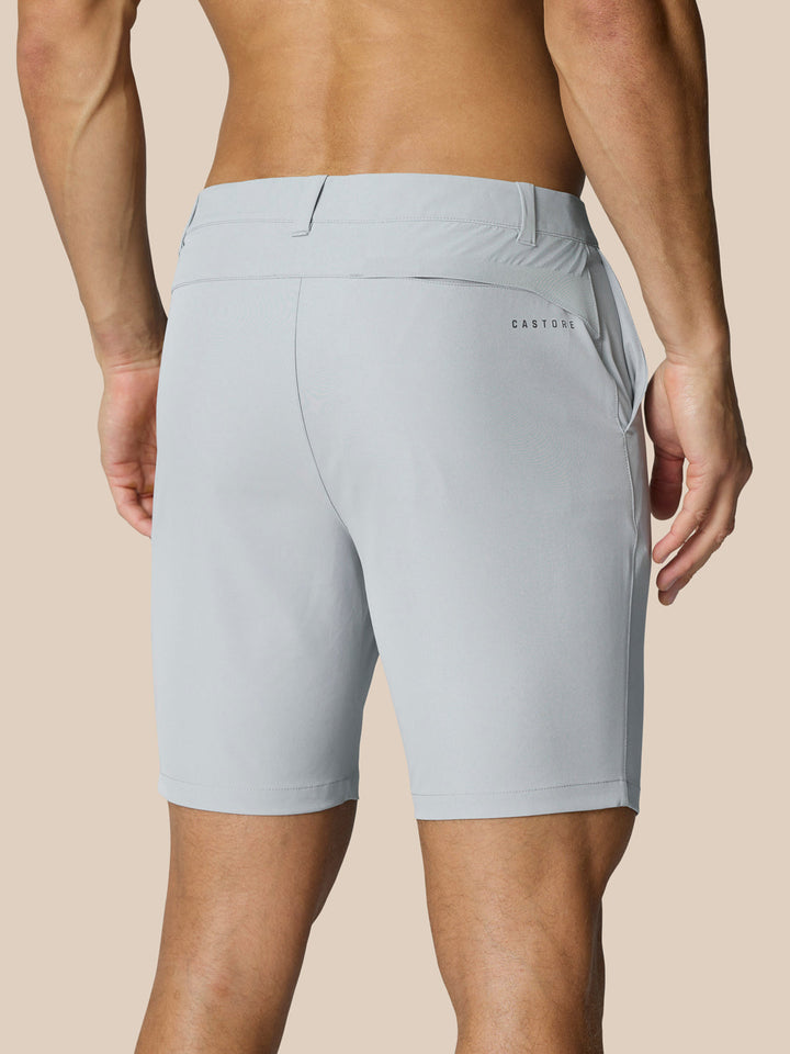 Back view of mid grey golf shorts featuring a right rear pocket and Castore branding on the hip
