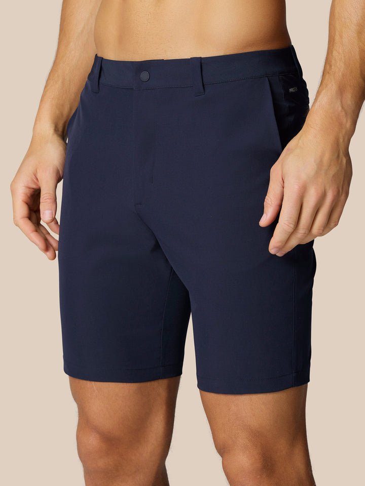 Navy Golf Club Shorts shown from back waist area with rear pocket and Castore branding on the leg.