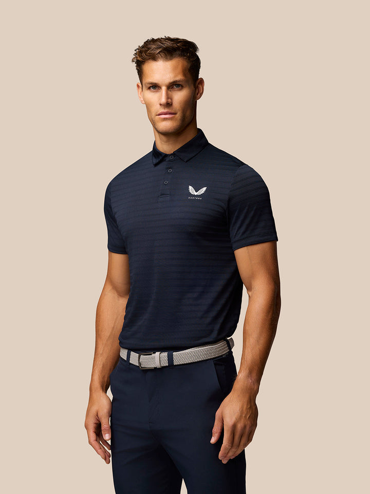 Navy Golf Pinnacle Pique Stripe Polo with stripe pattern and Castore logo on chest.