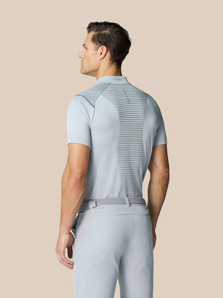 Back view of mid grey Pinnacle Golf LVS Polo showing bodymapped back ventilation panels and stripe pattern