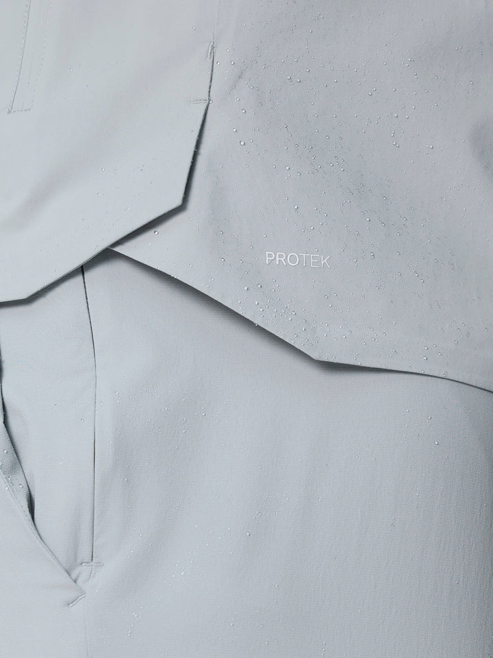 Close-up of water resistant fabric with droplets and PROTEK branding.