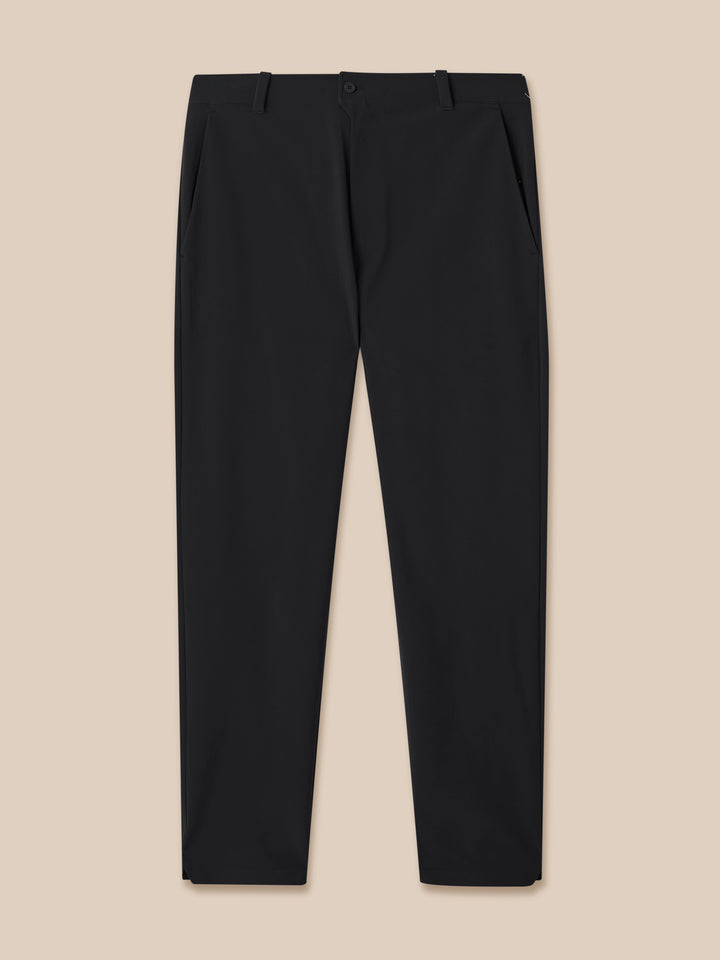 Front view of black golf trousers with waistband belt loops and button closure.
