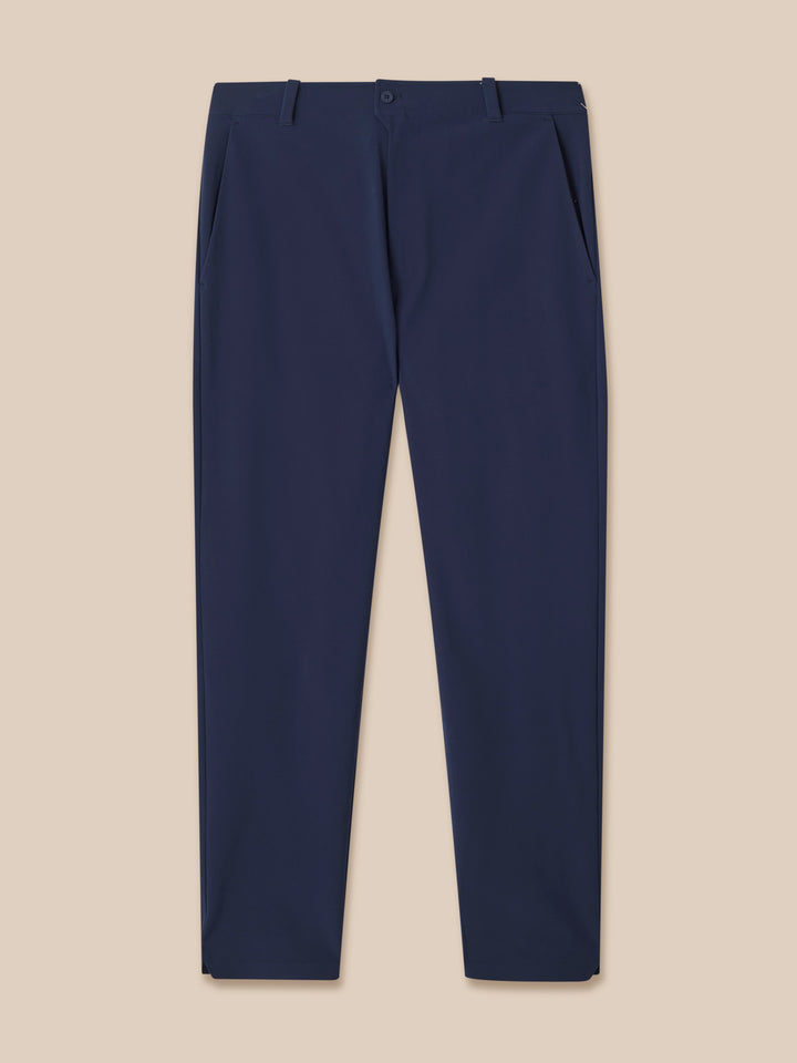 Back view of navy golf winter trousers showing a back pocket with Castore branding