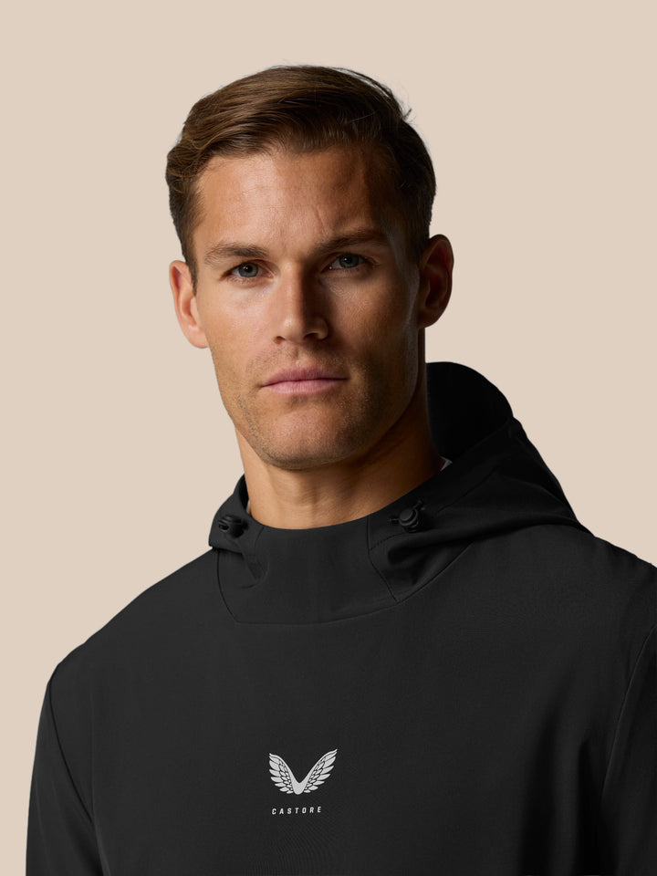 Close-up of the hoodie fabric with the Castore logo on the chest.