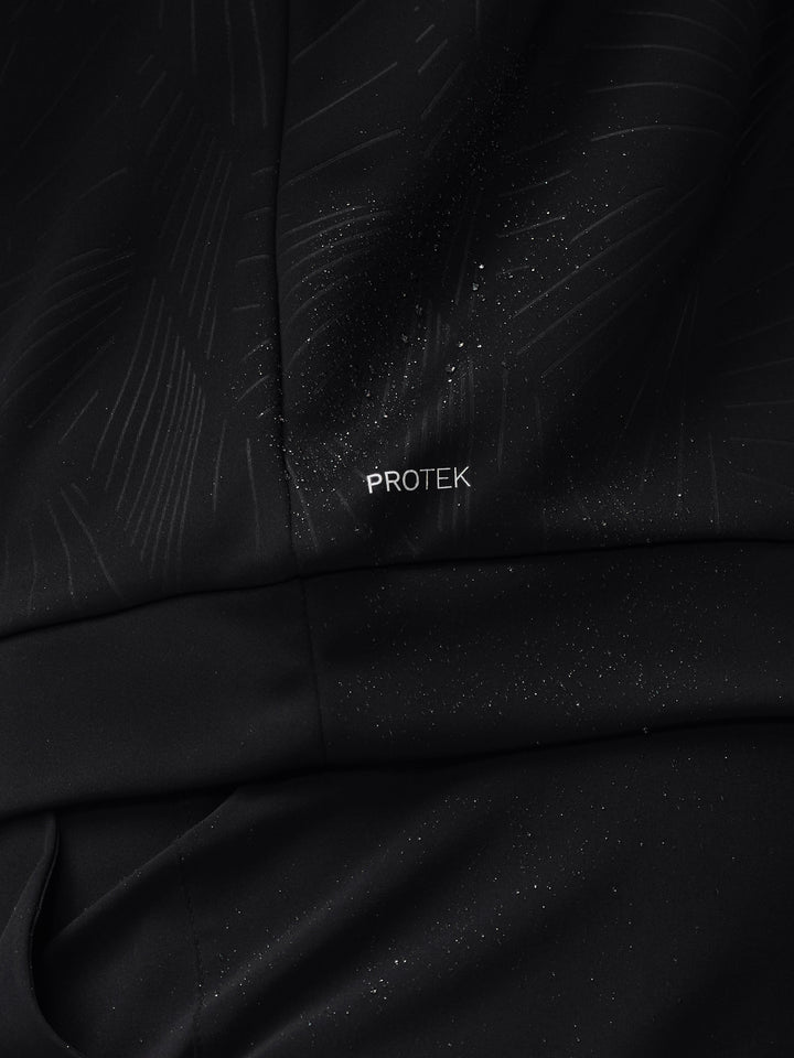 Close-up of black ProTek water resistant fabric with droplets and subtle pattern