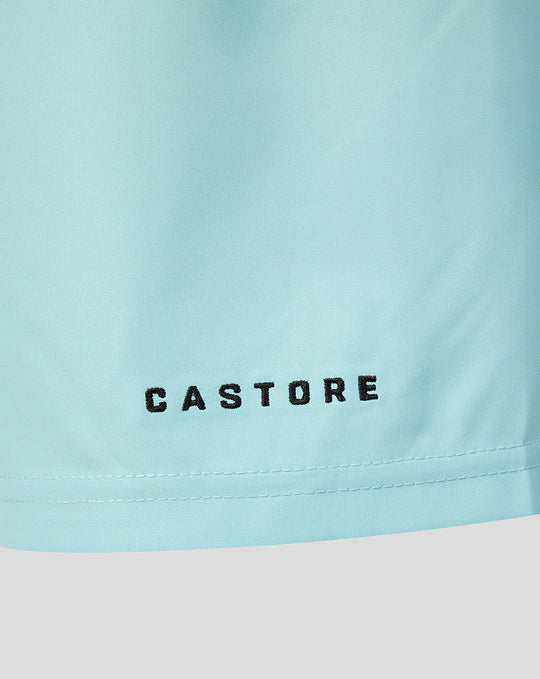 Close-up of light blue Castore fabric used for Harlequins junior away shorts.