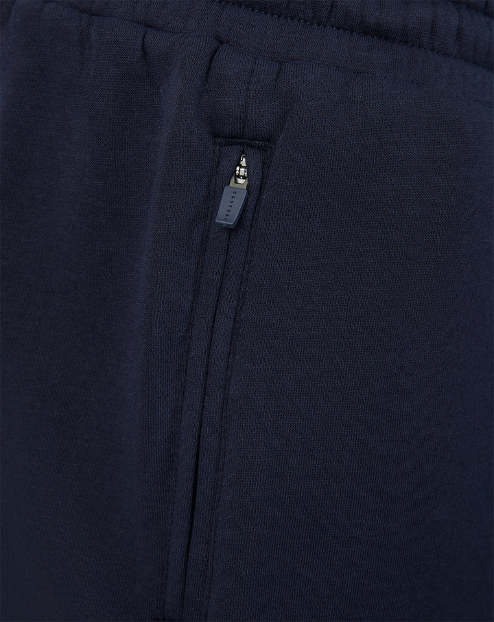 Navy Harlequins travel shorts pocket area with zipper pull marked Castore