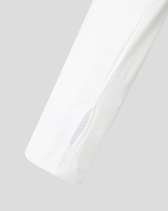Close-up of white sleeve showing clean seam and subtle design detail from Harlequins Matchday Quarter Zip.