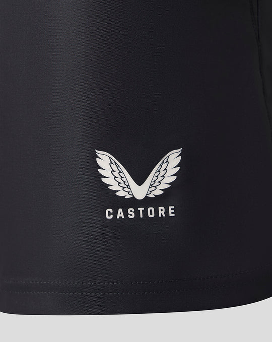 Close-up of dark navy Harlequins Big Game 18 replica shorts fabric with Castore logo and Harlequins crest