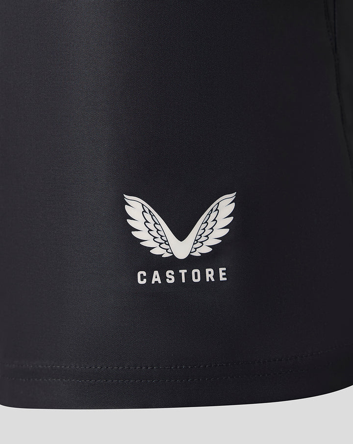 Close-up of dark navy Harlequins Big Game 18 replica shorts fabric with Castore logo and Harlequins crest