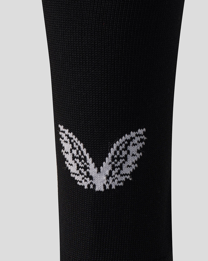 Close-up of black Harlequins Big Game 18 sock showing a white crest on the leg