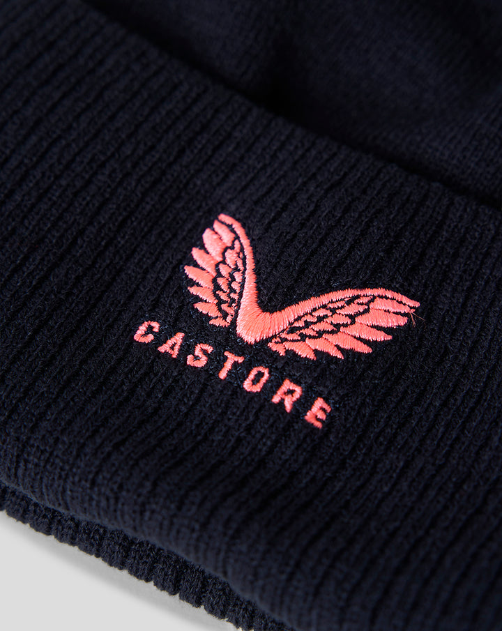 Close up of navy ribbed cuff showing pink Castore wing embroidery and CASTORE lettering