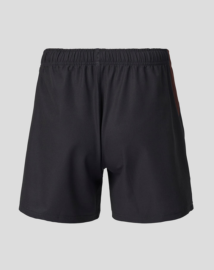 Back view of black Harlequins women's home pro shorts with a brown side panel detail