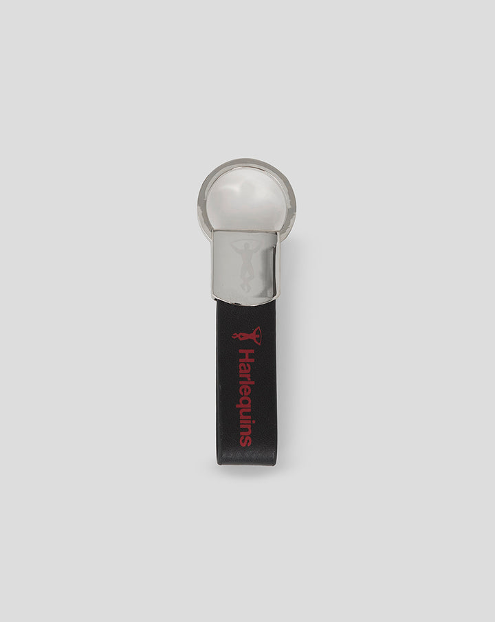 Harlequins metal loop keyring with a black leather strap and red Harlequins branding