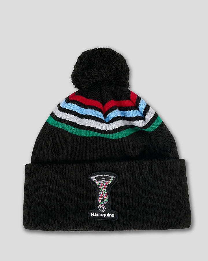 Harlequins bobble hat with black body a multicolor four stripe band and a black pom pom with Harlequins patch