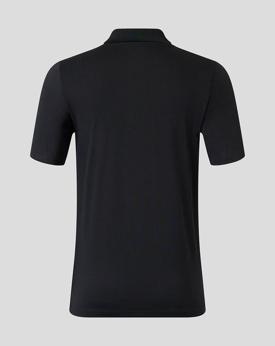 Back view of black Harlequins polo shirt with clean seams and a classic collar