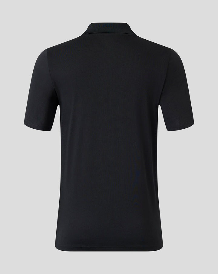 Back view of black Harlequins polo shirt with clean seams and a classic collar