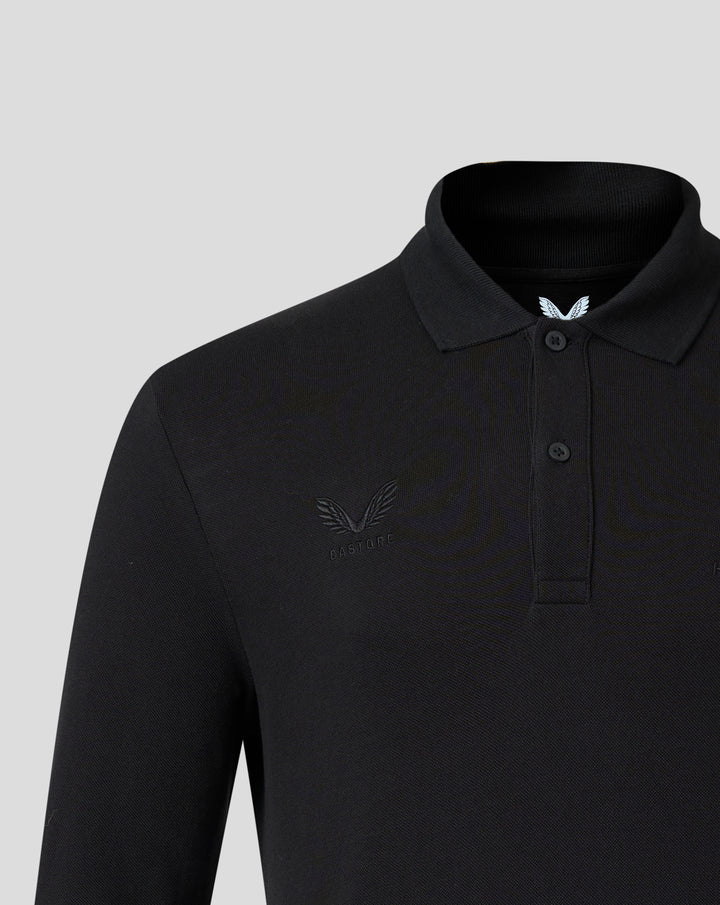 Close up of a black Harlequins long sleeve polo collar showing subtle embroidery of the crest and Castore branding