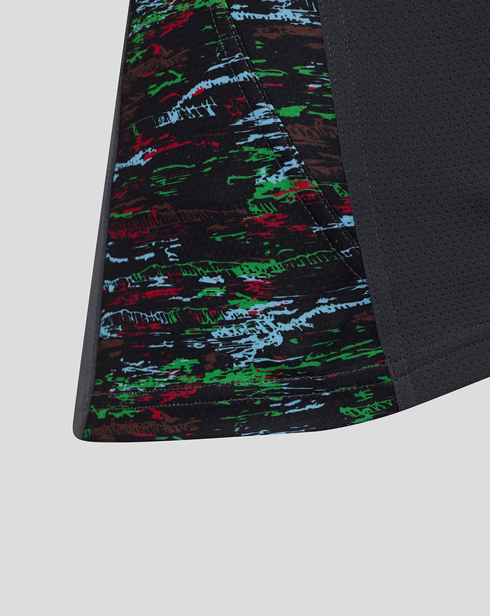 Side panel detail showing colorful abstract print on the ebony training vest.