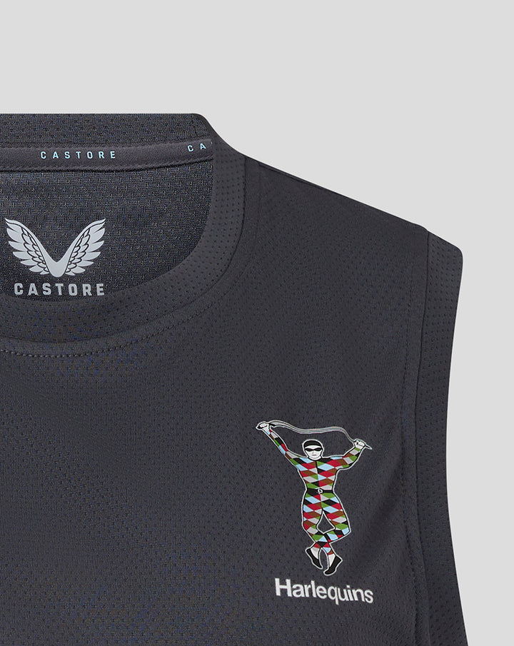 Close up of the dark mesh vest highlighting Castore branding at the neck and the Harlequins crest.