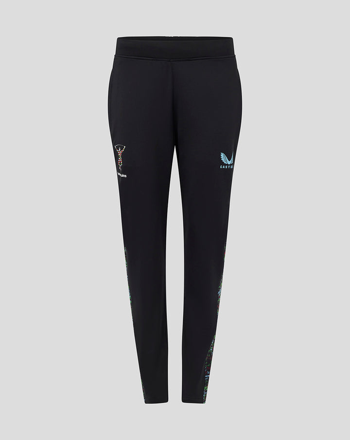Front view of women's black Harlequins training knit pants with side pockets and crest on the thigh