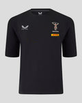 Front view of black Harlequins travel tee featuring a club crest on the chest and sponsor logos.
