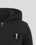 Front view close-up of a black youth hoodie with zipper and a square Harlequins logo patch on the chest