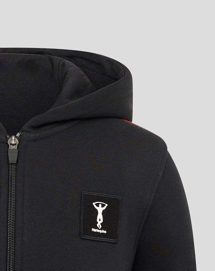Front view close-up of a black youth hoodie with zipper and a square Harlequins logo patch on the chest