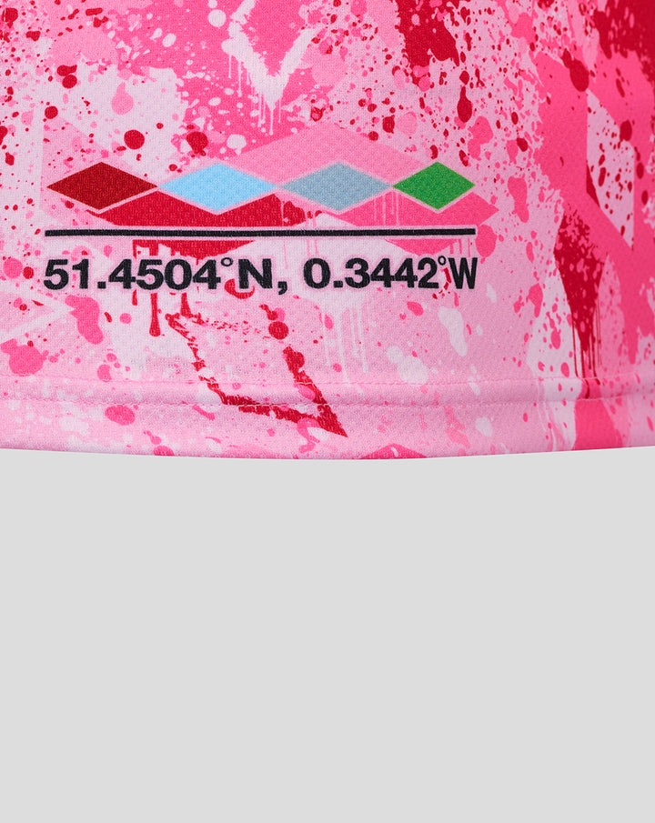 Close up of pink jersey print featuring coordinates and colorful diamond pattern