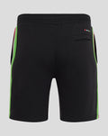 Back view of black shorts with neon green side panels and a small rear pocket.