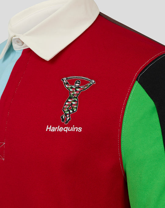 Close up of red Harlequins rugby shirt with white collar and embroidered logo.